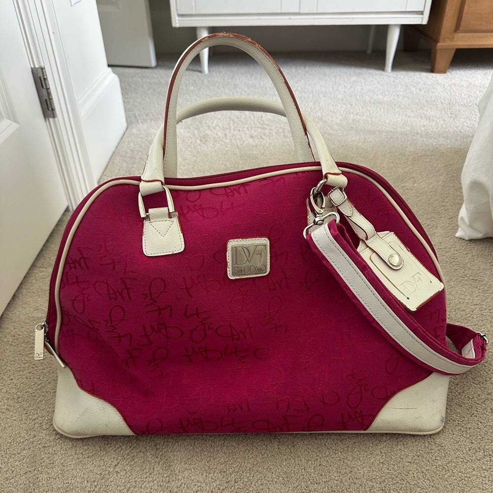 DVF studio pink and white Carry-on luggage travel tote personal item bag.